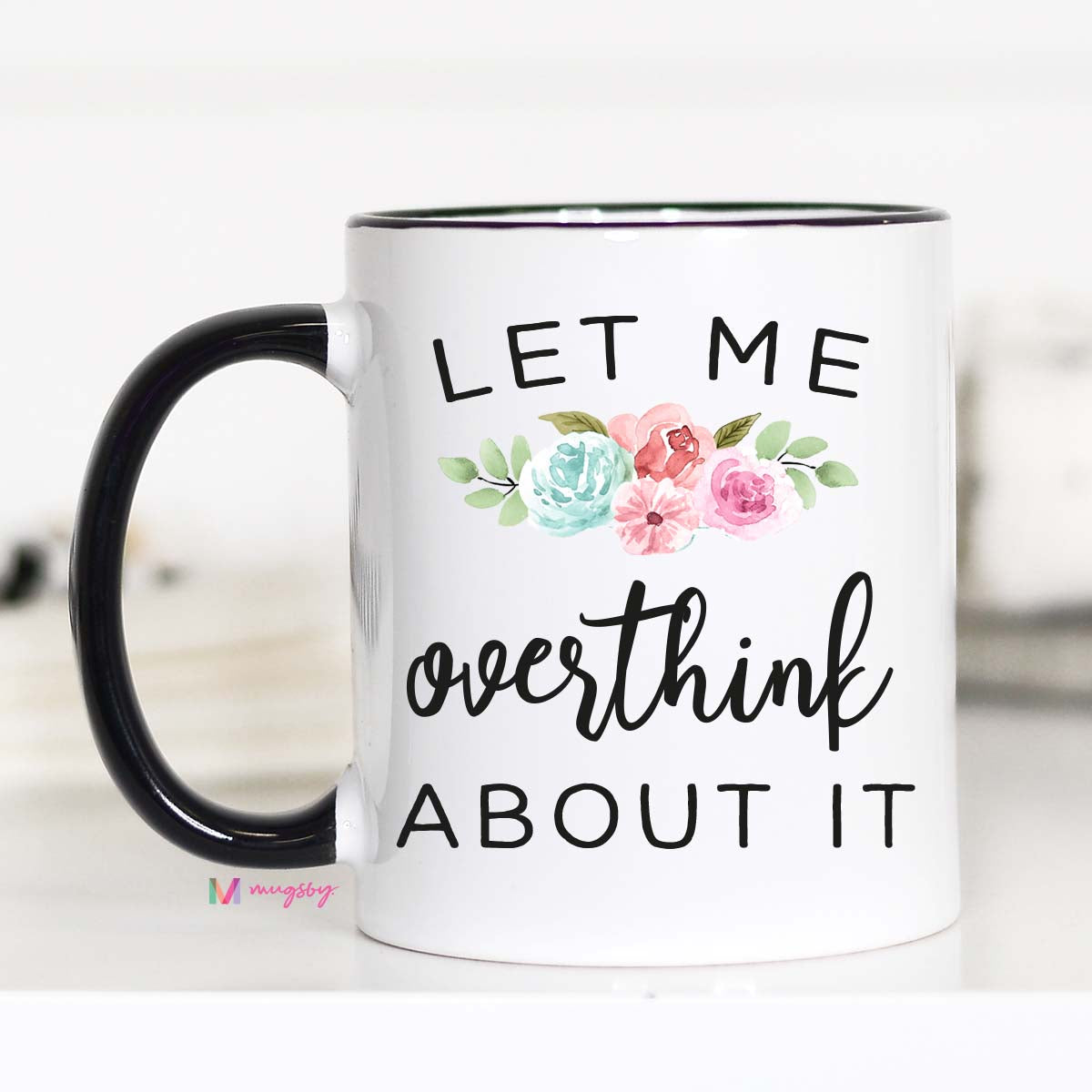 11 ounce mug black hand and rim. Floral design "Let me overthink about it"