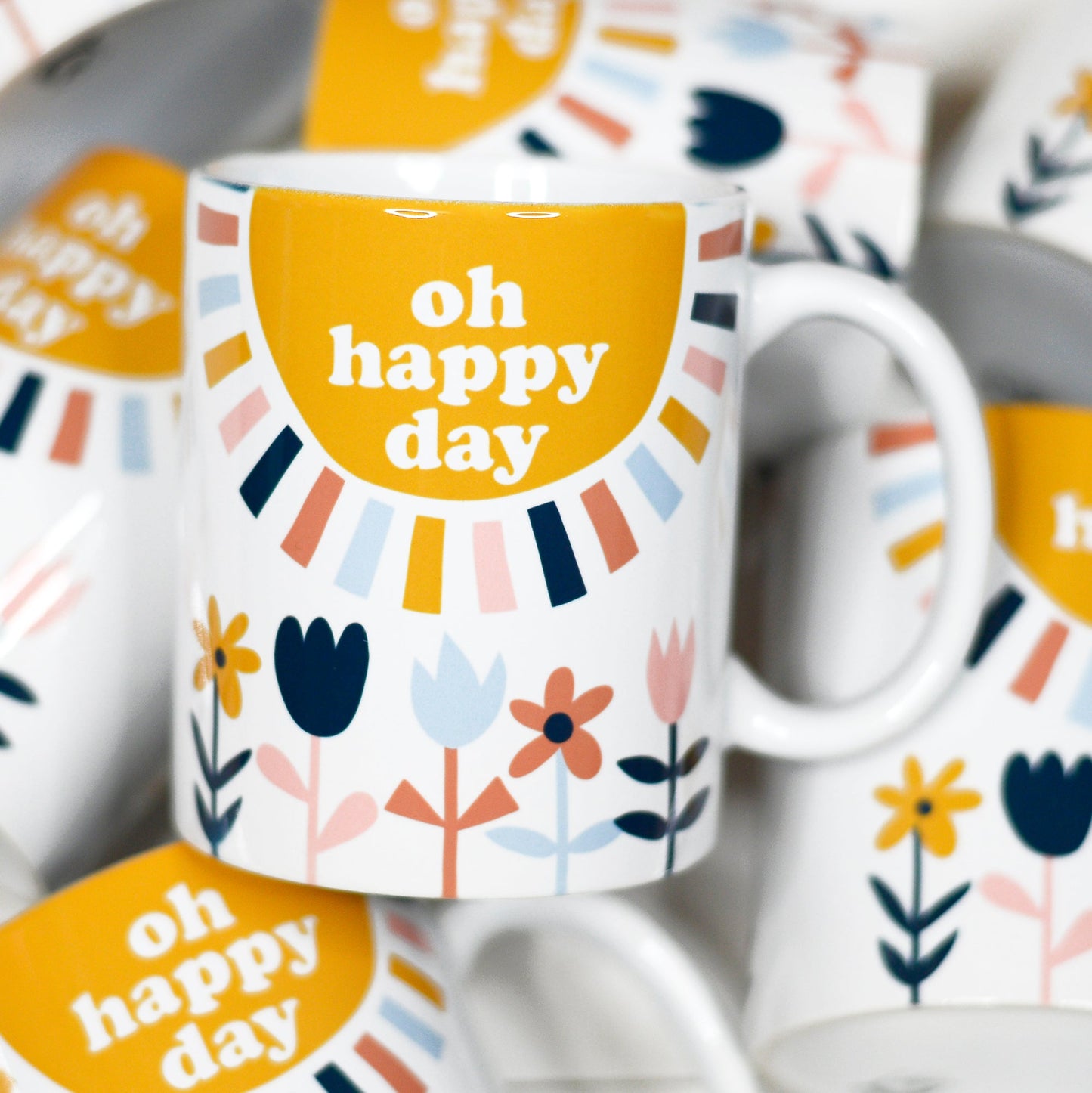 11 ounce white mug. Sun with text "oh happy day" florals below