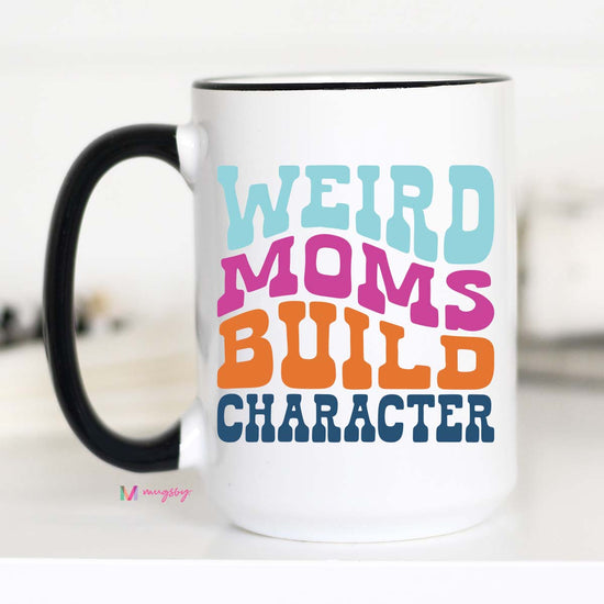 15 oz mug. Black handle and rim. "weird moms build character"